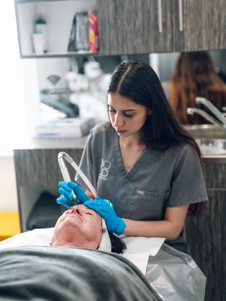 3D Aesthetics Leamington Spa therapist performing facial treatment