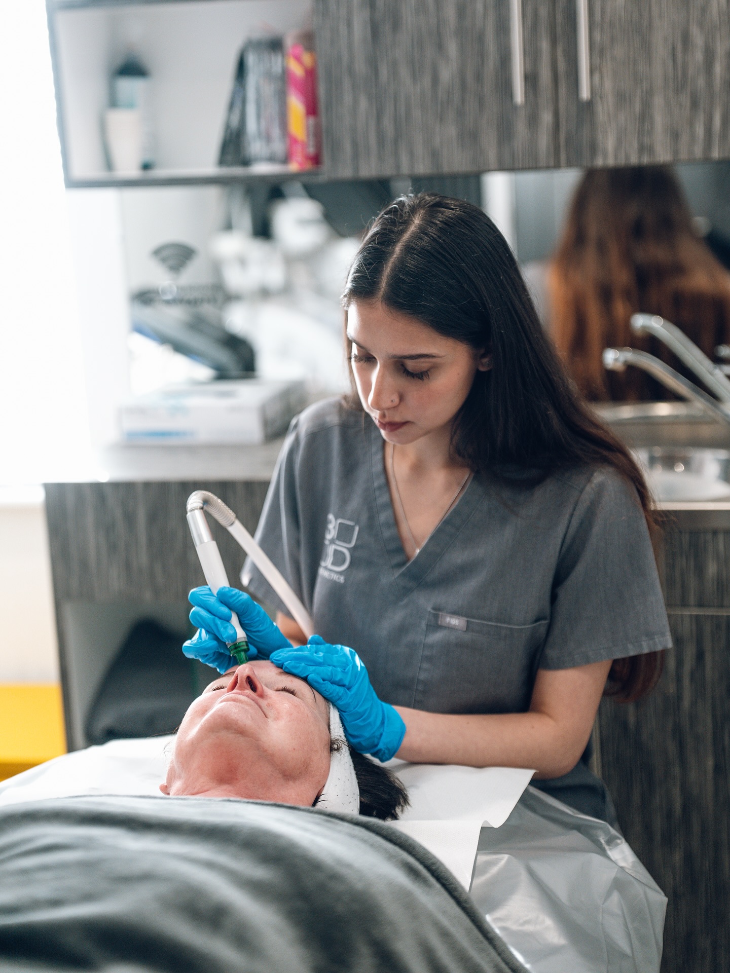 3D Aesthetics Leamington Spa therapist performing facial treatment