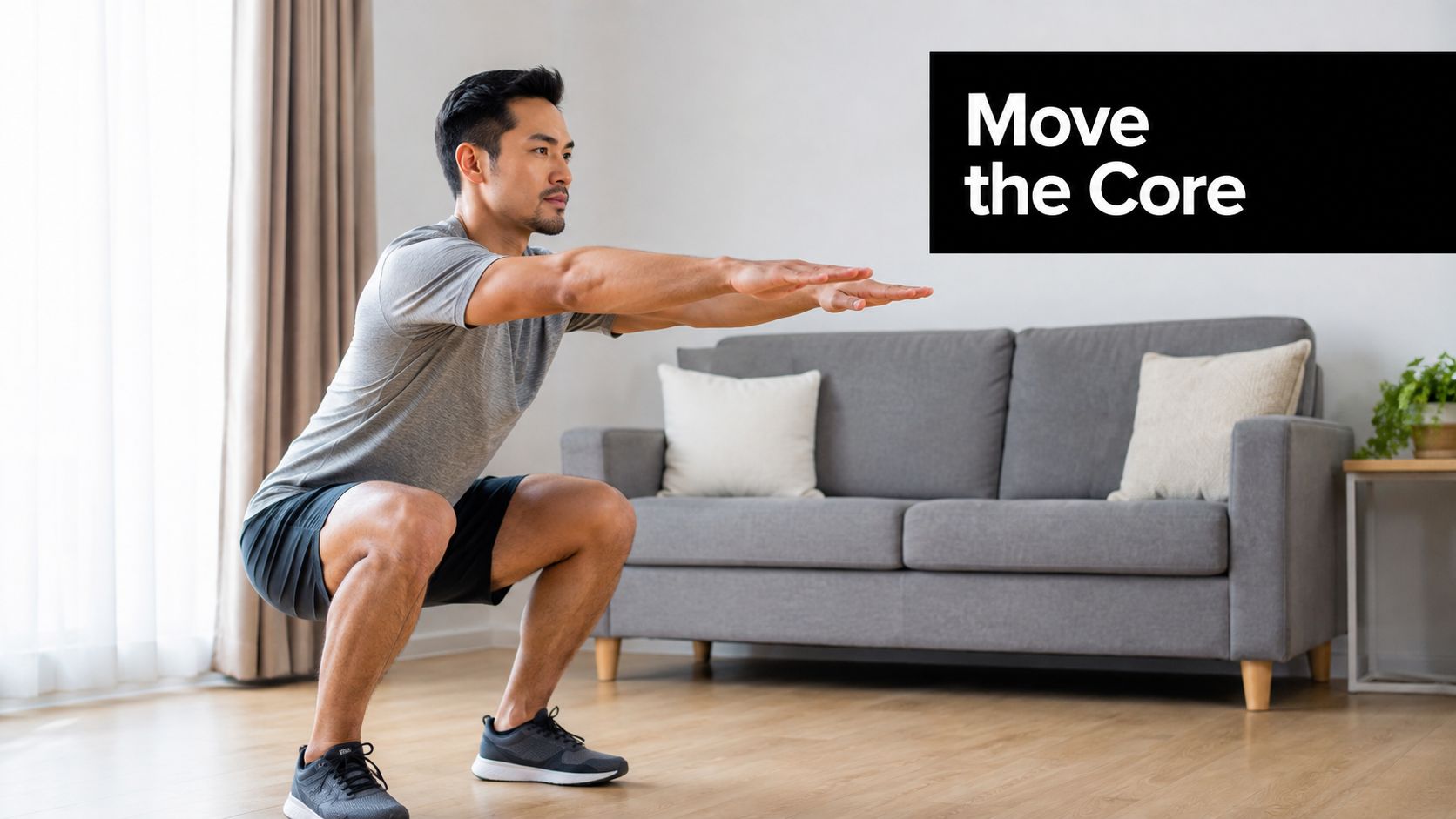 A man performing a bodyweight squat in a modern living room for home workout and core training.